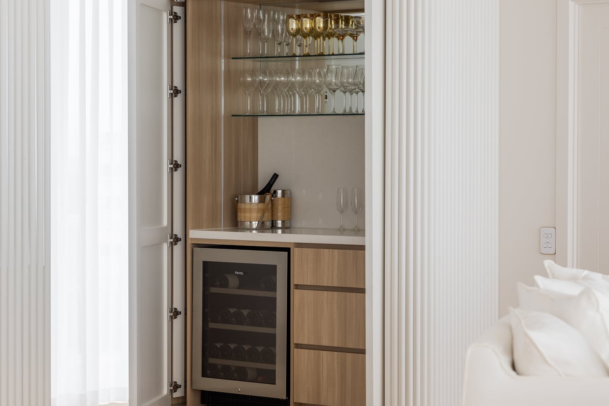 Custom home bar joinery installed alongside a builder