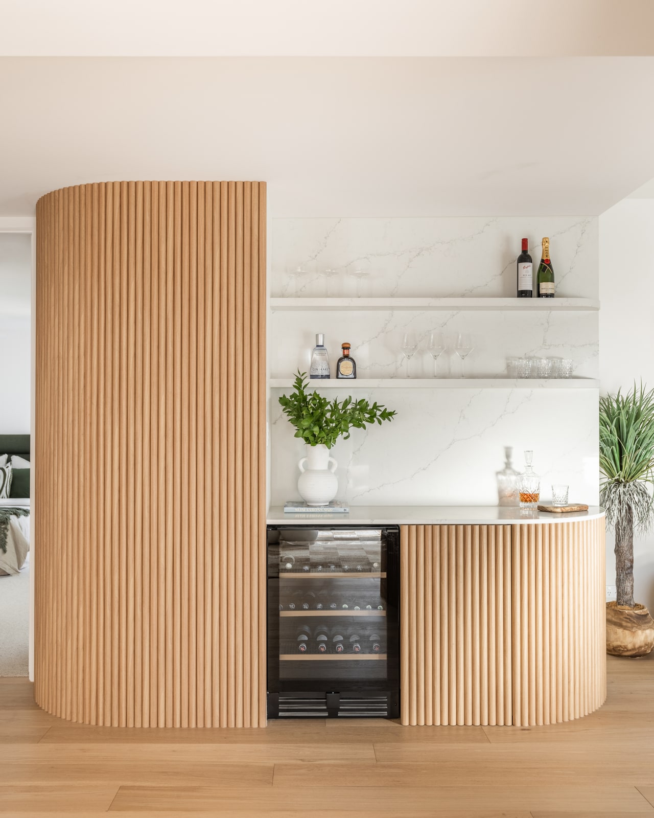 The finished fluted-oak home bar, built from the design - Paradise Point