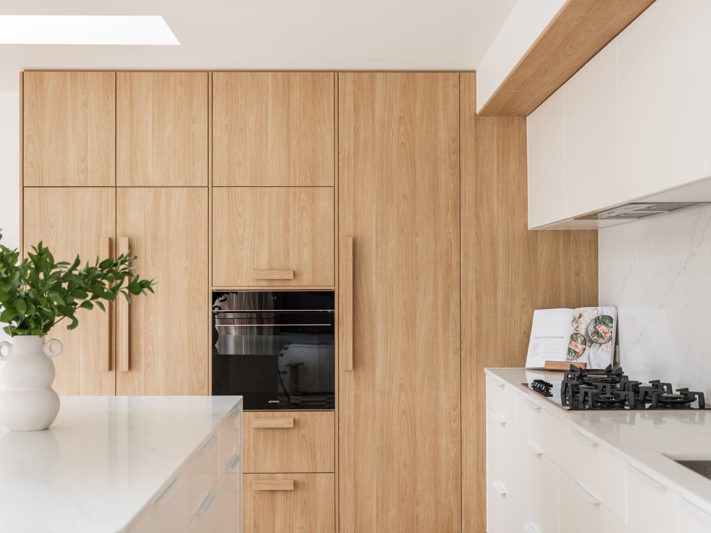 Oak kitchen with full-height timber cabinetry and a stone island - 4D Cabinetry kitchen renovations
